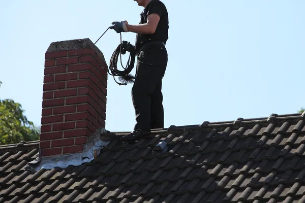 Lincolnway Chimney Care team standing by a service vehicle